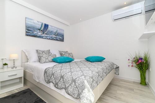 Posteľ alebo postele v izbe v ubytovaní Apartment Sani
