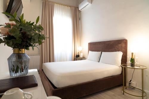 Cama o camas de una habitación en Hotel Ginori Al Duomo