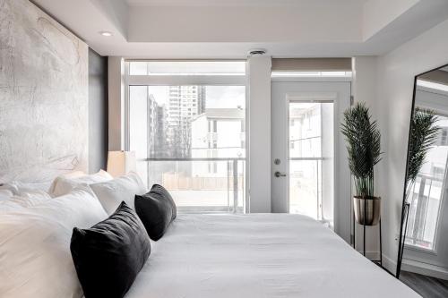 Ένα ή περισσότερα κρεβάτια σε δωμάτιο στο Westview Luxury Suites