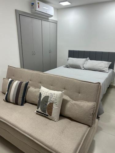 Ένα ή περισσότερα κρεβάτια σε δωμάτιο στο Apartment studio São Mateus