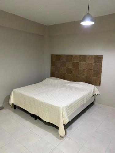 a bedroom with a bed in a room at Mono ambiente en el centro 3 in Santiago del Estero