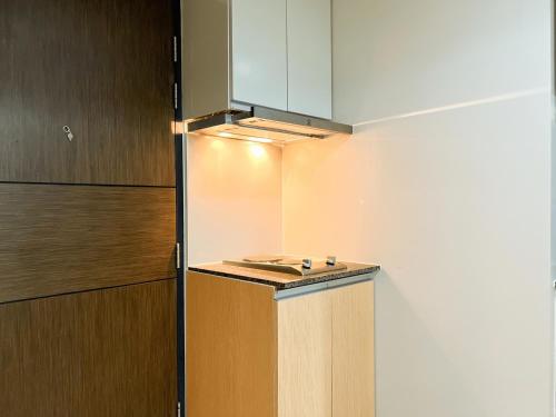 Kuchyň nebo kuchyňský kout v ubytování Prime 1br Condo Infront Grand Hyatt BGC #oursw20d1