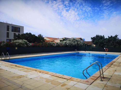 Appart bord de mer, piscine et clim