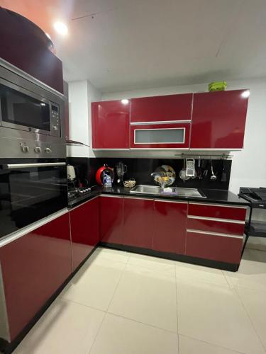 Dapur atau dapur kecil di Beachside Charming Apartment