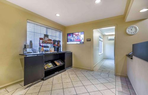 a room with a refrigerator in the corner of a room at Extended Stay America Suites - Washington, DC - Rockville in Rockville