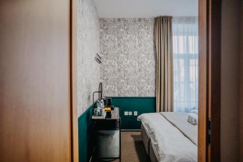 Ένα ή περισσότερα κρεβάτια σε δωμάτιο στο Casa