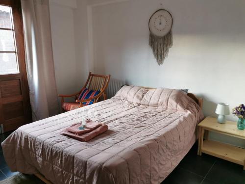 Postel nebo postele na pokoji v ubytování El Jardin Sagrado de Nunay
