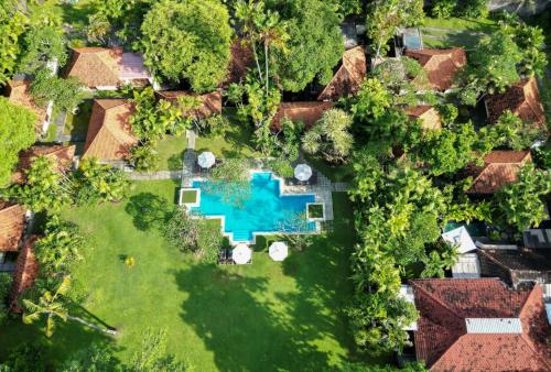 an aerial view of a house with a swimming pool at Natah Bale Villas in Sanur