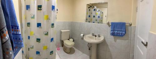 Ένα μπάνιο στο Habitaciones privadas en Centro de La Paz