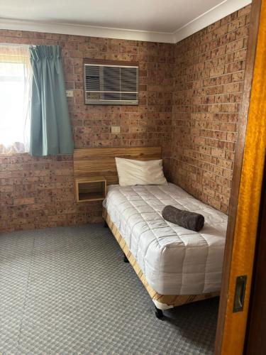 Postel nebo postele na pokoji v ubytování Alyn Motel