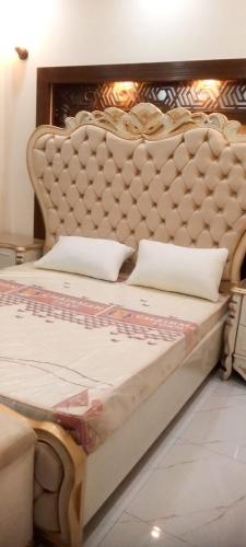 En eller flere senge i et værelse på Vacation Homes