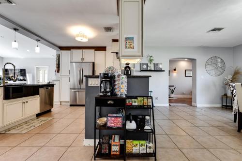 a kitchen with a counter with food on it at South Florida Spacious Oasis 4BR Retreat with 2 King Beds, Amazing Pool, near Beaches in Deerfield Beach