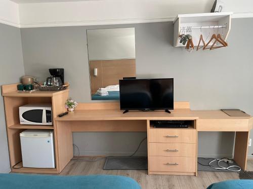 Kuchyň nebo kuchyňský kout v ubytování Motel au P'tit Sapin