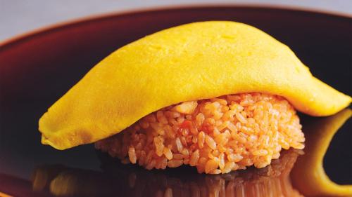 a close up of a piece of food with rice at Miyako Hotel Kyoto Hachijo in Kyoto