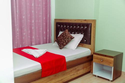 Voodi või voodid majutusasutuse Hotel Old Darbar toas