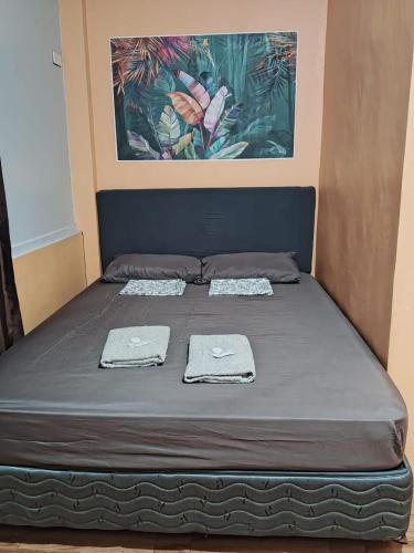 House Rental Banaba Treeにあるベッド