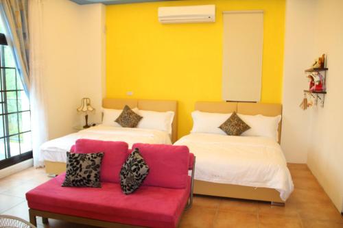 Ein Bett oder Betten in einem Zimmer der Unterkunft Hasayaki Homestay