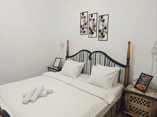 Ένα ή περισσότερα κρεβάτια σε δωμάτιο στο Stay In Tmisoara