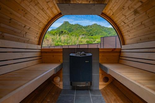 an inside view of a sauna with a window at 天神郷 昊 in Tenjingō