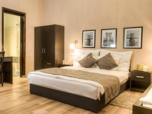 מיטה או מיטות בחדר ב-Budapest Ville Bed & Breakfast