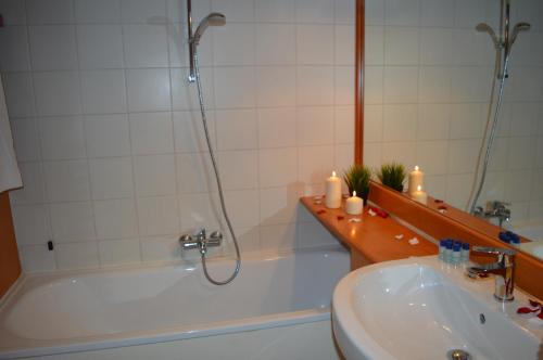 Kylpyhuone majoituspaikassa Residence Il Vigo di Marilleva