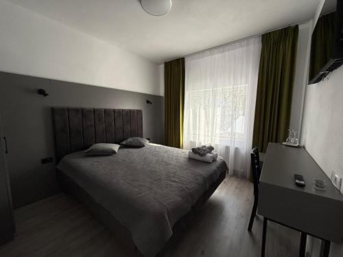 Ένα ή περισσότερα κρεβάτια σε δωμάτιο στο Casa Maya
