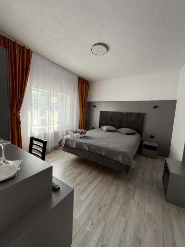Ένα ή περισσότερα κρεβάτια σε δωμάτιο στο Casa Maya