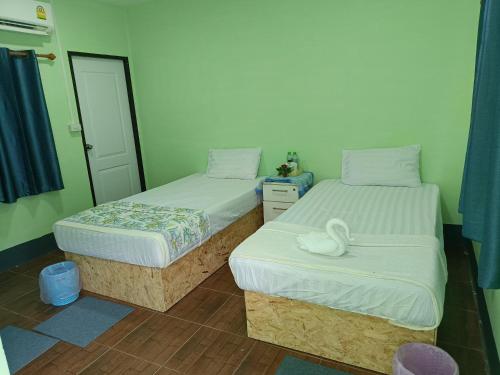 Postel nebo postele na pokoji v ubytování Bussaracum Resort