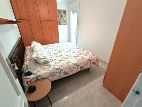 Postel nebo postele na pokoji v ubytování CUNIT PLaYA