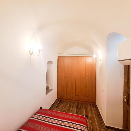 Ένα ή περισσότερα κρεβάτια σε δωμάτιο στο Atrium Manor House 嵐