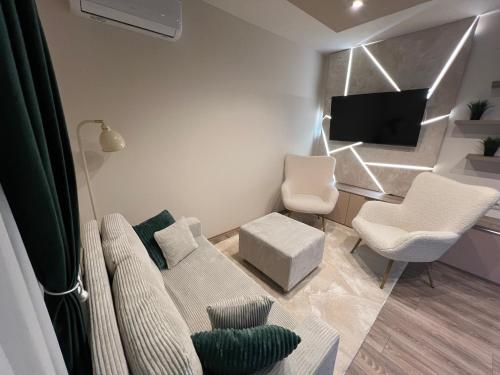 Χώρος καθιστικού στο Mirina Apartmanok