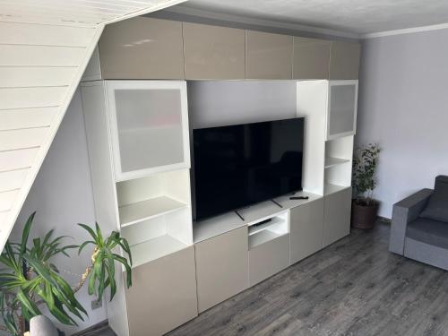 Telewizja i/lub zestaw kina domowego w obiekcie NaturHouse Poznań
