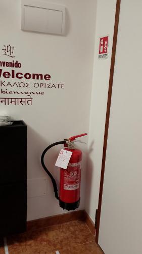 a fire hydrant in the corner of a room at Appartamento Paprika 1966 una comfort zone in Savigliano