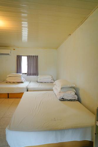 Cama o camas de una habitación en Liu Fu Shan Zhuang