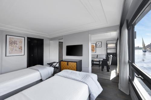Postel nebo postele na pokoji v ubytování Mövenpick MS Sunray