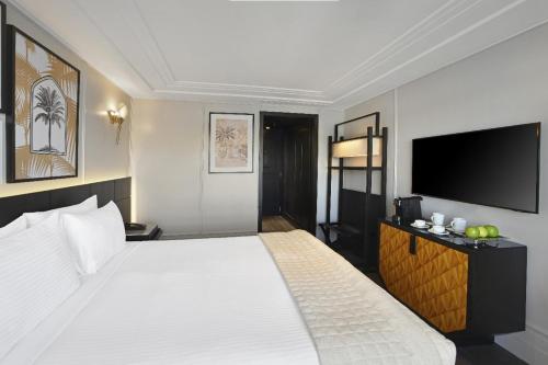 Postel nebo postele na pokoji v ubytování Mövenpick MS Sunray