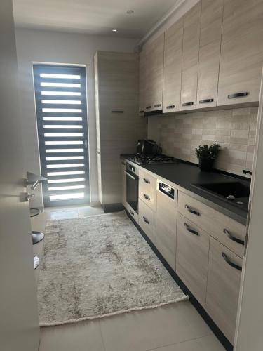 Η κουζίνα ή μικρή κουζίνα στο Apartament Modern NordmarkResidence