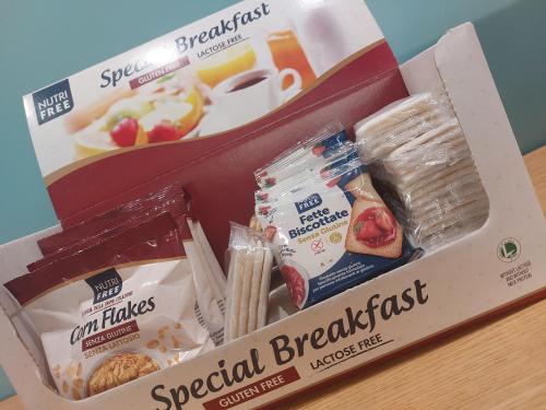 a box of breakfast food on a table at Hotel La Pergola in Grezzana