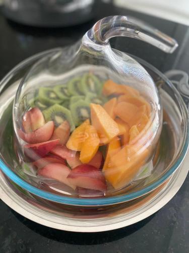 a bowl of fruit and vegetables on a plate at LD Ianuzziello Residence - BB in Scanzano