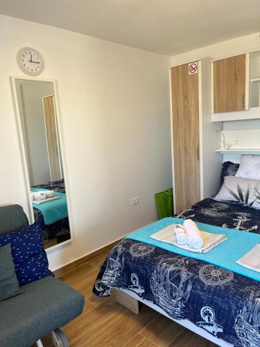 Llit o llits en una habitació de Apartmani Sirius