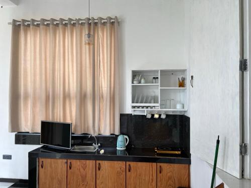 Kuchyň nebo kuchyňský kout v ubytování Dream House Kanda