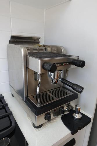 a espresso machine sitting on top of a counter at Prospectors Rest in Maldon