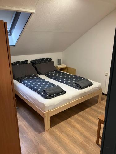 Postel nebo postele na pokoji v ubytování DIÓ Vendégház