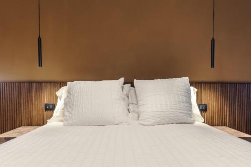 Letto o letti in una camera di Cereate Suites