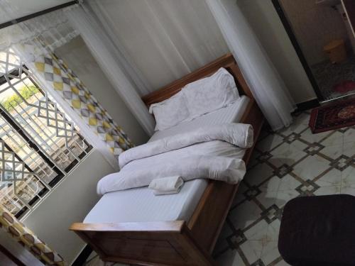 Ένα ή περισσότερα κρεβάτια σε δωμάτιο στο Sweetland view hotel