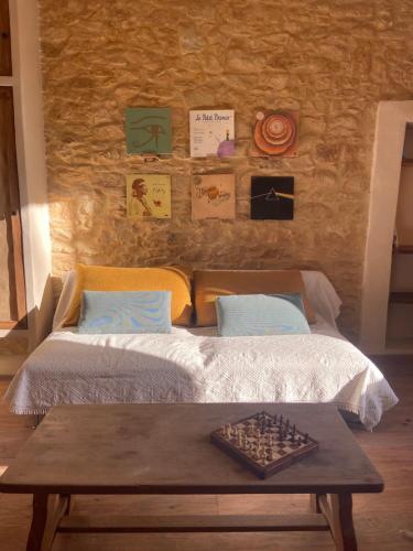 Postel nebo postele na pokoji v ubytování Maison as Cambous