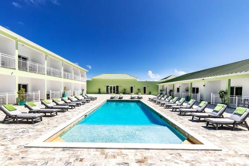 a pool in the courtyard of a hotel at Ocean Breeze Resort in NCA