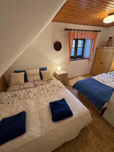 Postel nebo postele na pokoji v ubytování Vyhlídka Platoř