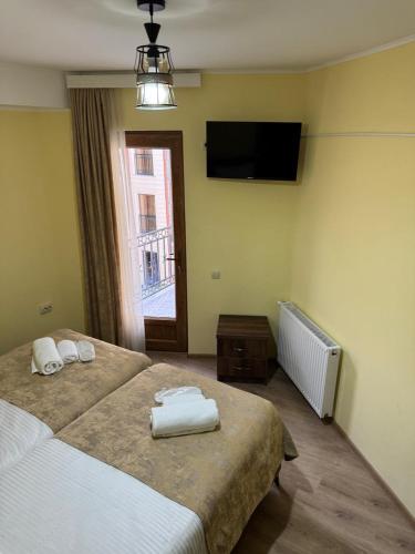 Postel nebo postele na pokoji v ubytování Lileo Kutaisi - Hotel&Winery