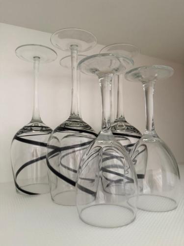 a group of wine glasses sitting next to each other at Koombana Bay beach Homestay in Bunbury